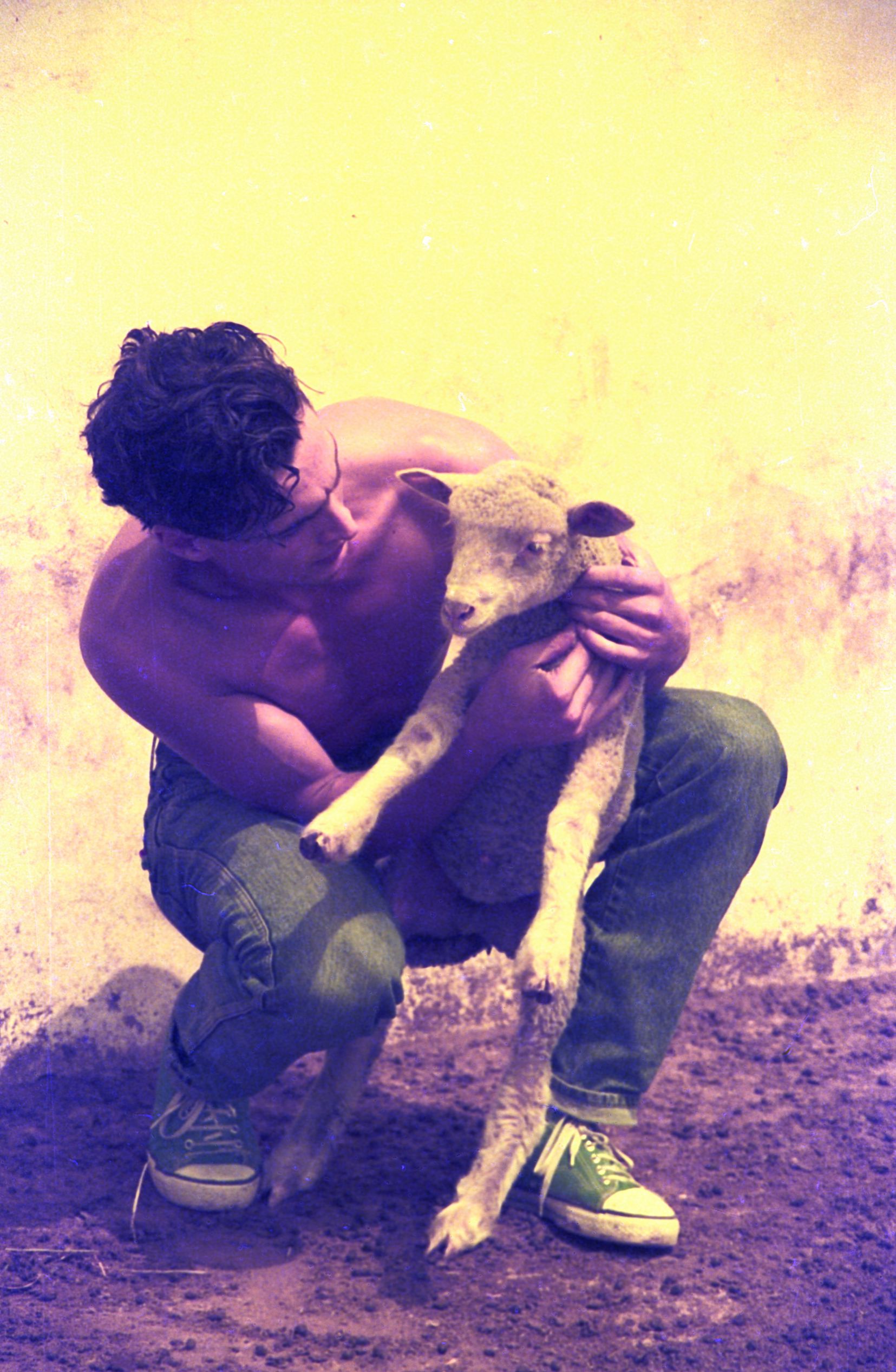 A young man with a lamb in 1992