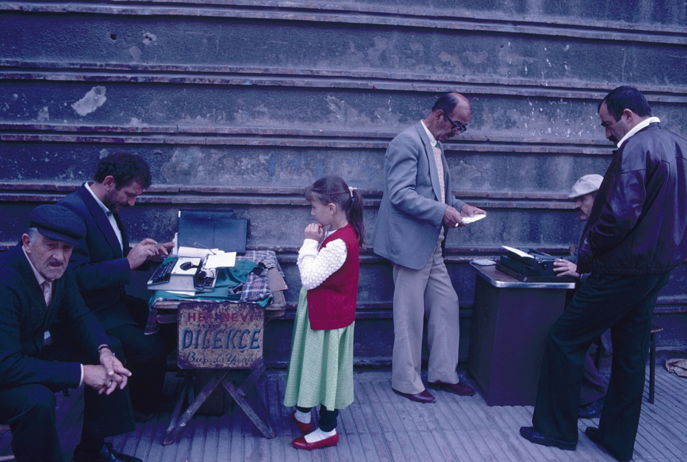 Young girl waiting at a typewriter in Istanbul in 1986